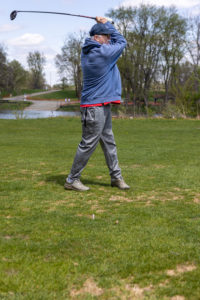 Man swinging the golf club